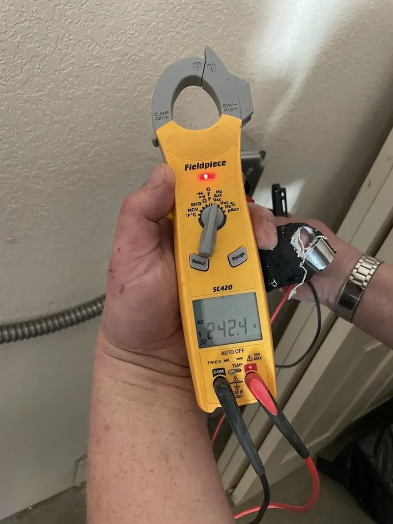 Voltage testing with clamp meter during Hot Tub / Pool Electrical Wiring in Washington